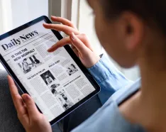 person reading on tablet