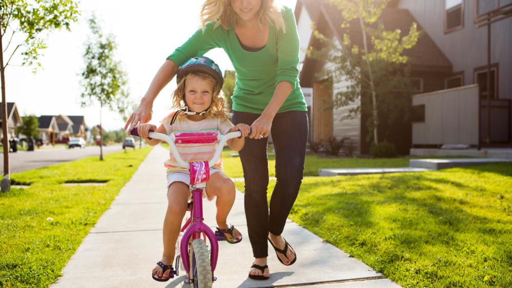 kid learning to ride a bike