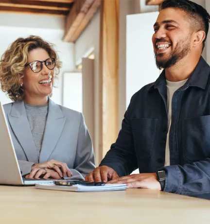 Image of two business colleagues interacting